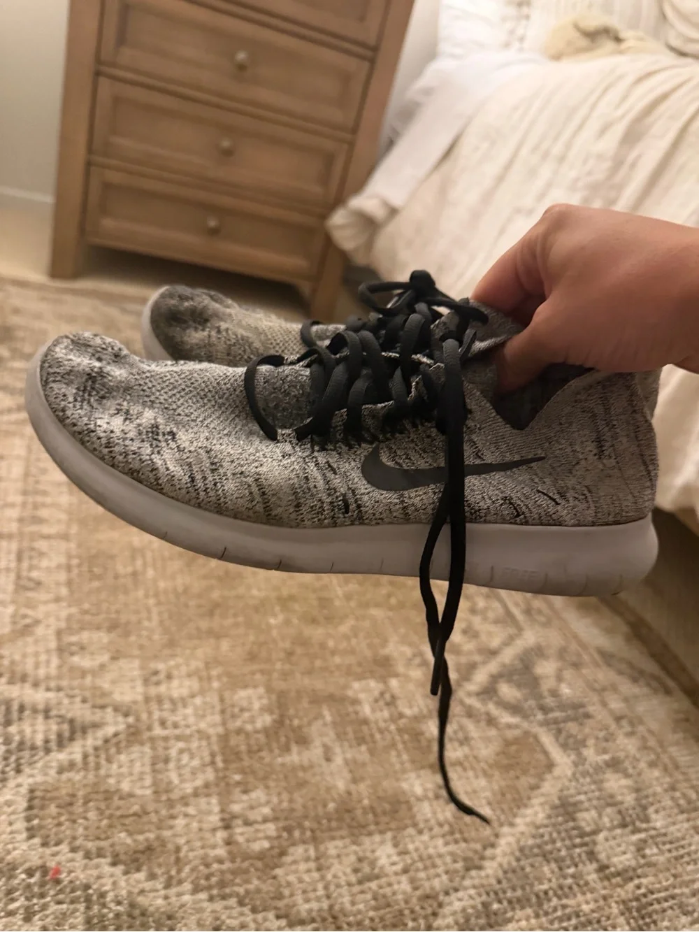 Nike Light Gray Flyknit Sneakers with Black Swoosh